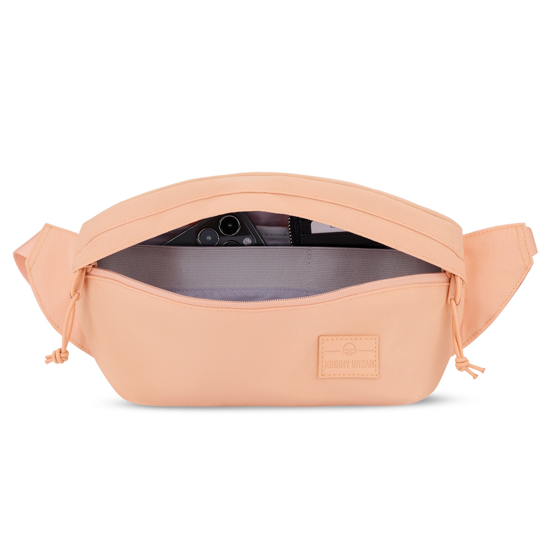 Pfirsichfarbene Bauchtasche 'Tom' von Johnny Urban mit geöffnetem Reißverschluss und sichtbarem Smartphonefach