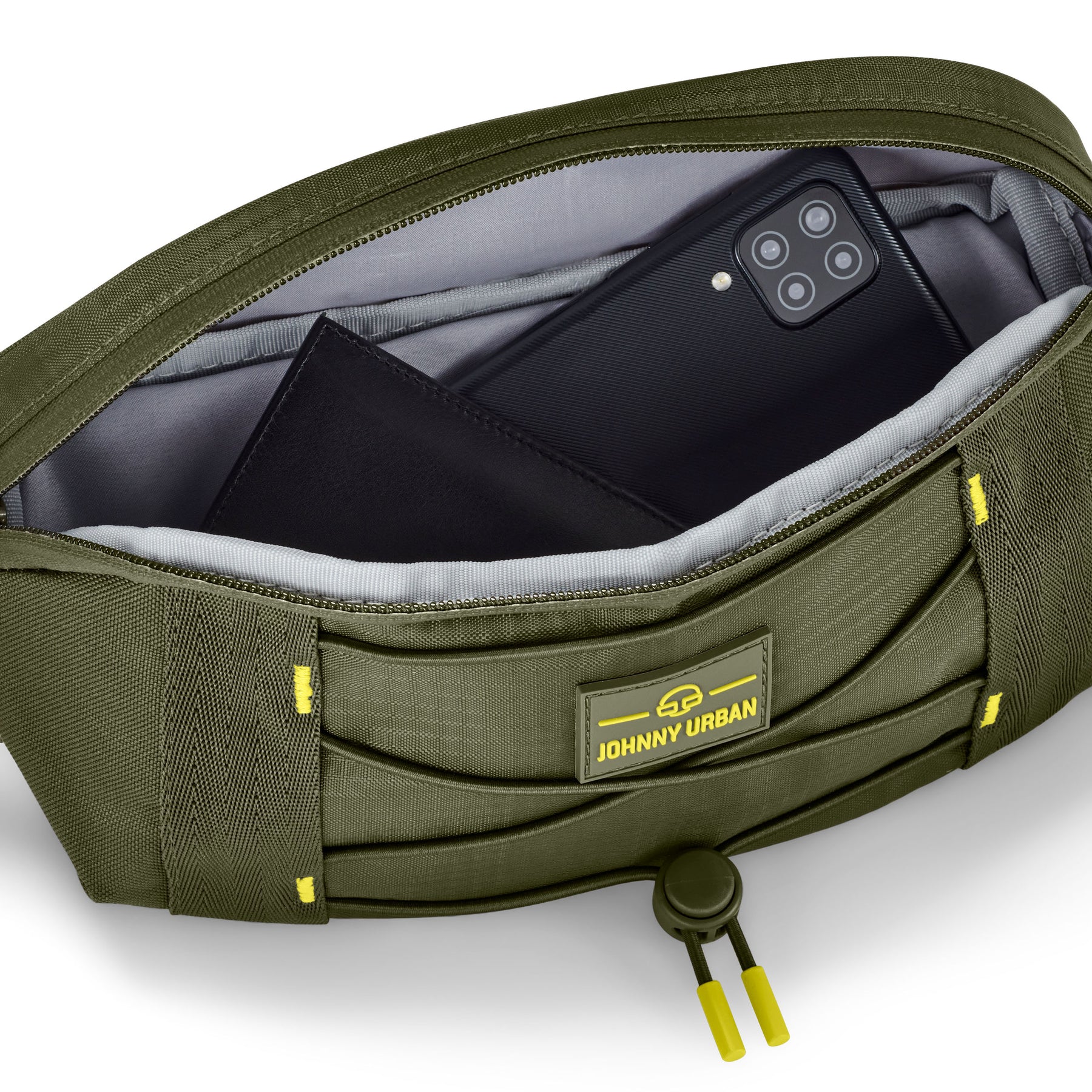 Olivefarbene Bauchtasche 'Devin' von Johnny Urban mit geöffnetem Hauptfach, das ein Smartphone und eine Geldbörse enthält