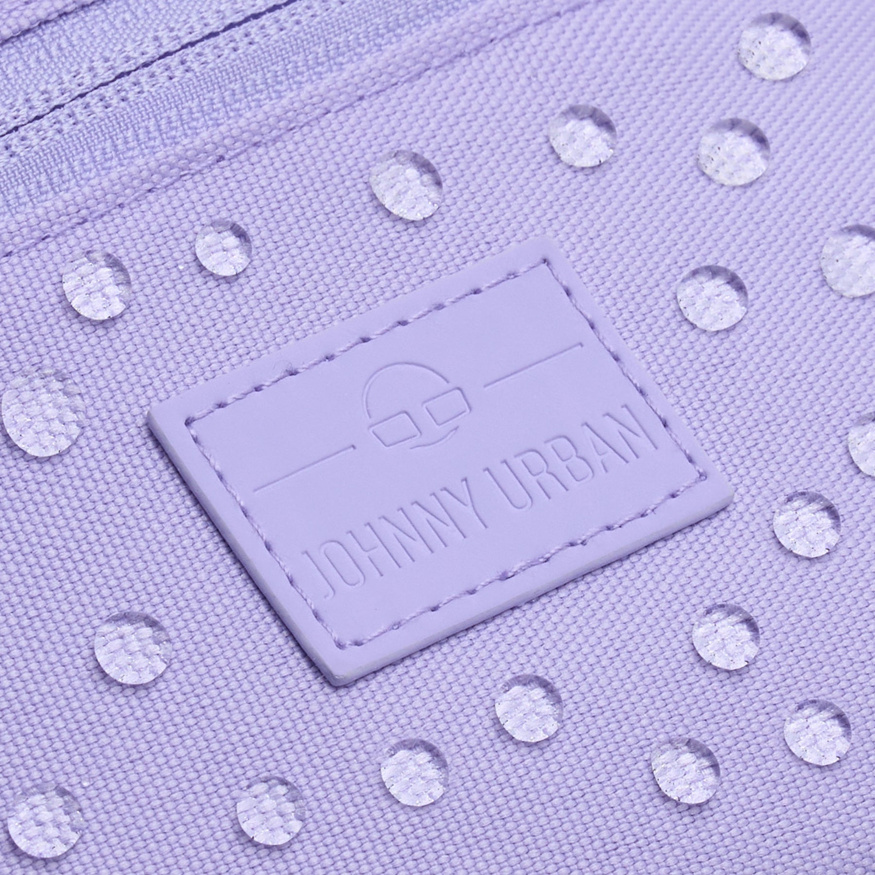 Wasserabweisende lila Bauchtasche 'Erik Small' von Johnny Urban mit Logo auf dem Etikett