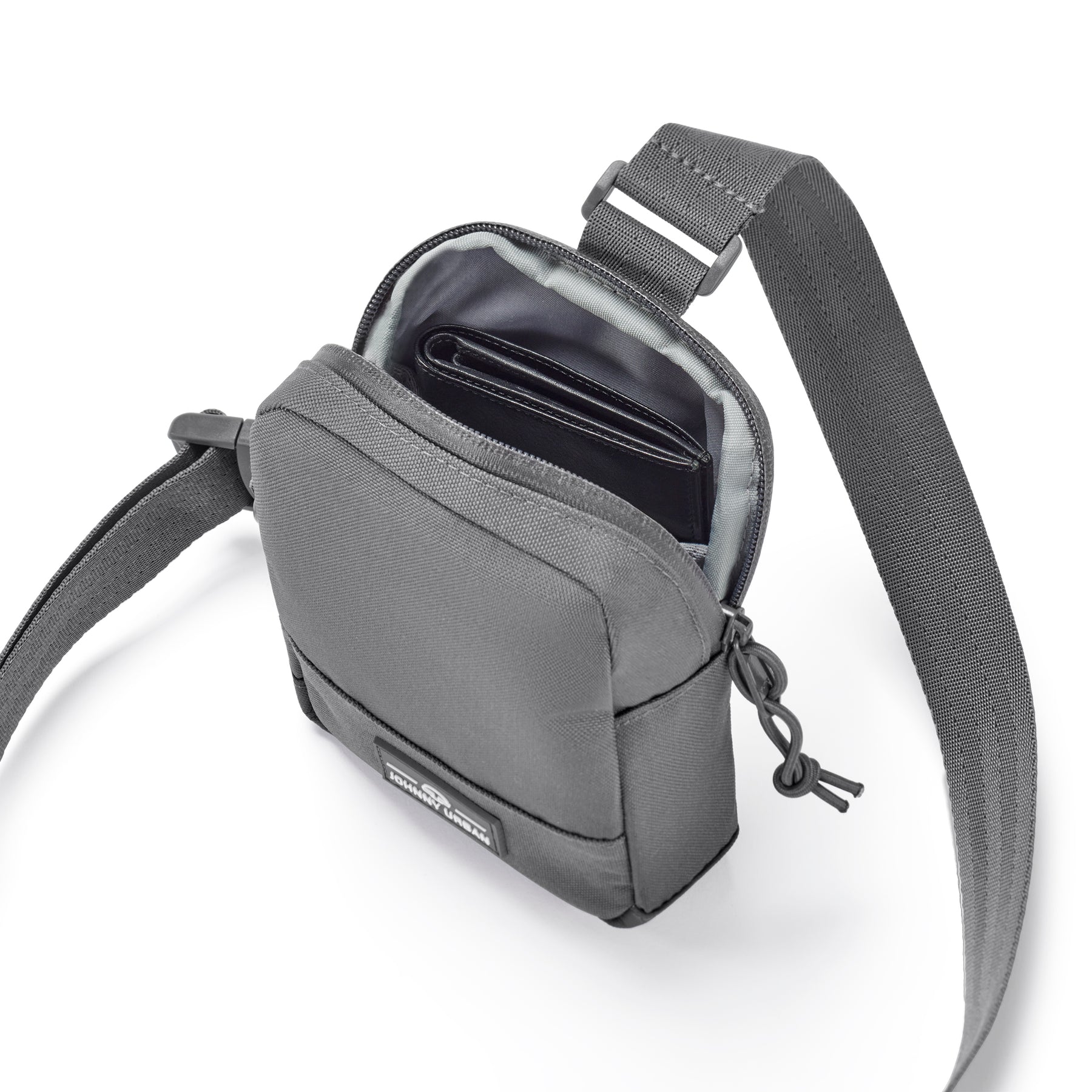 Front Pack ´Arthur´ von Johnny Urban in Grau mit geöffnetem Hauptfach und sichtbarem schwarzen Portemonnaie