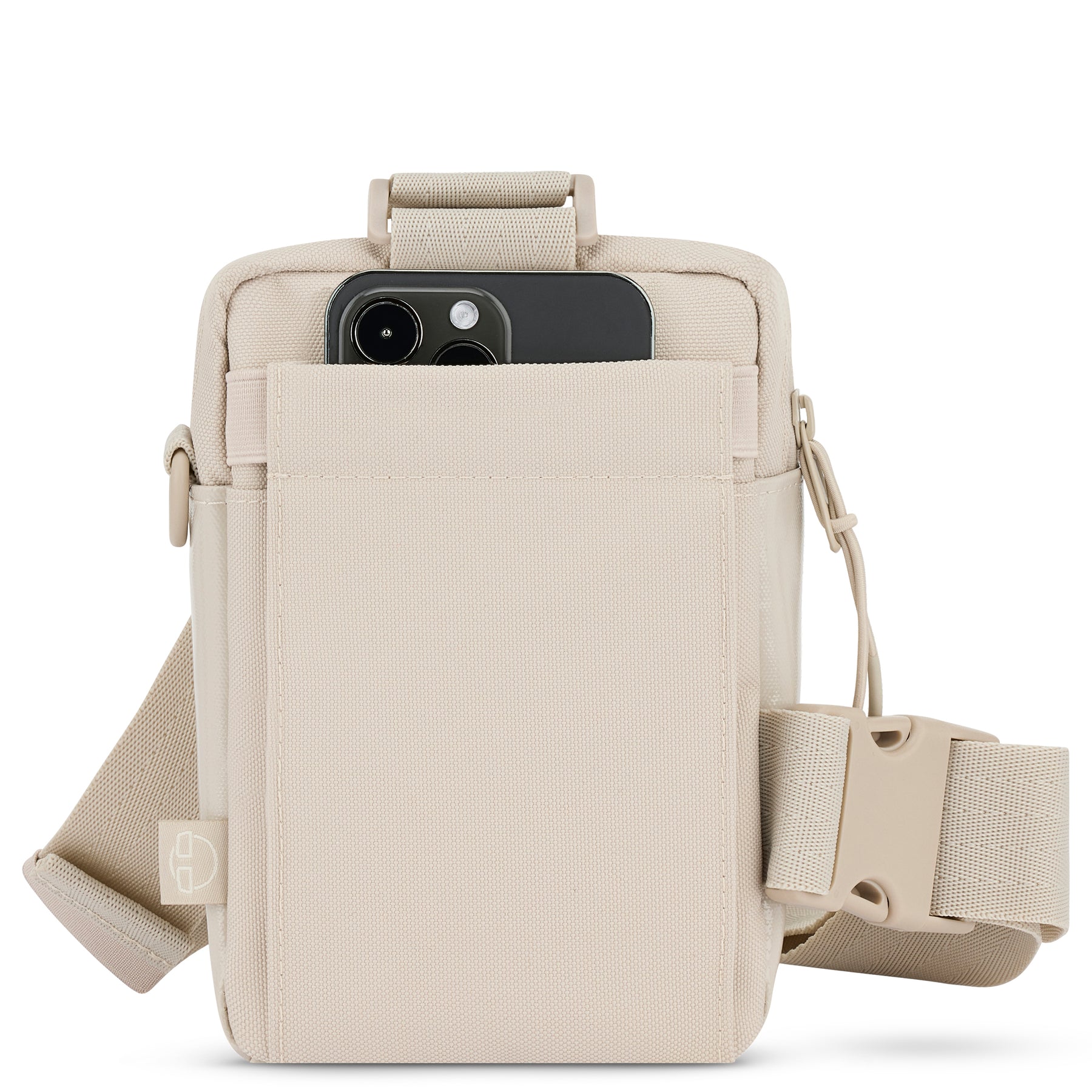 Beige Umhängetasche 'Lex' mit Außentasche, in der ein Smartphone steckt