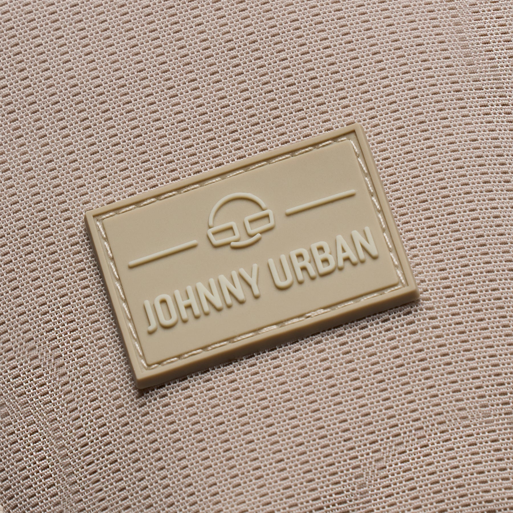Beiges, wasserabweisendes Textilgewebe mit Johnny Urban Logo in gelbem Patch