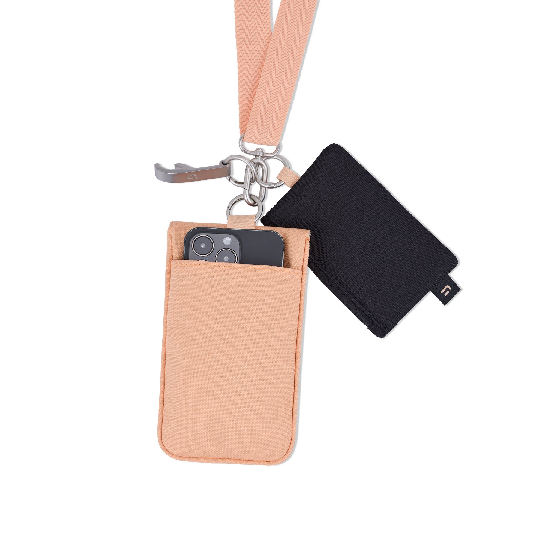 Johnny Urban Halsbeutel 'Juno' in Pfirsich mit schwarzem Schlüsselanhänger und Handyfach