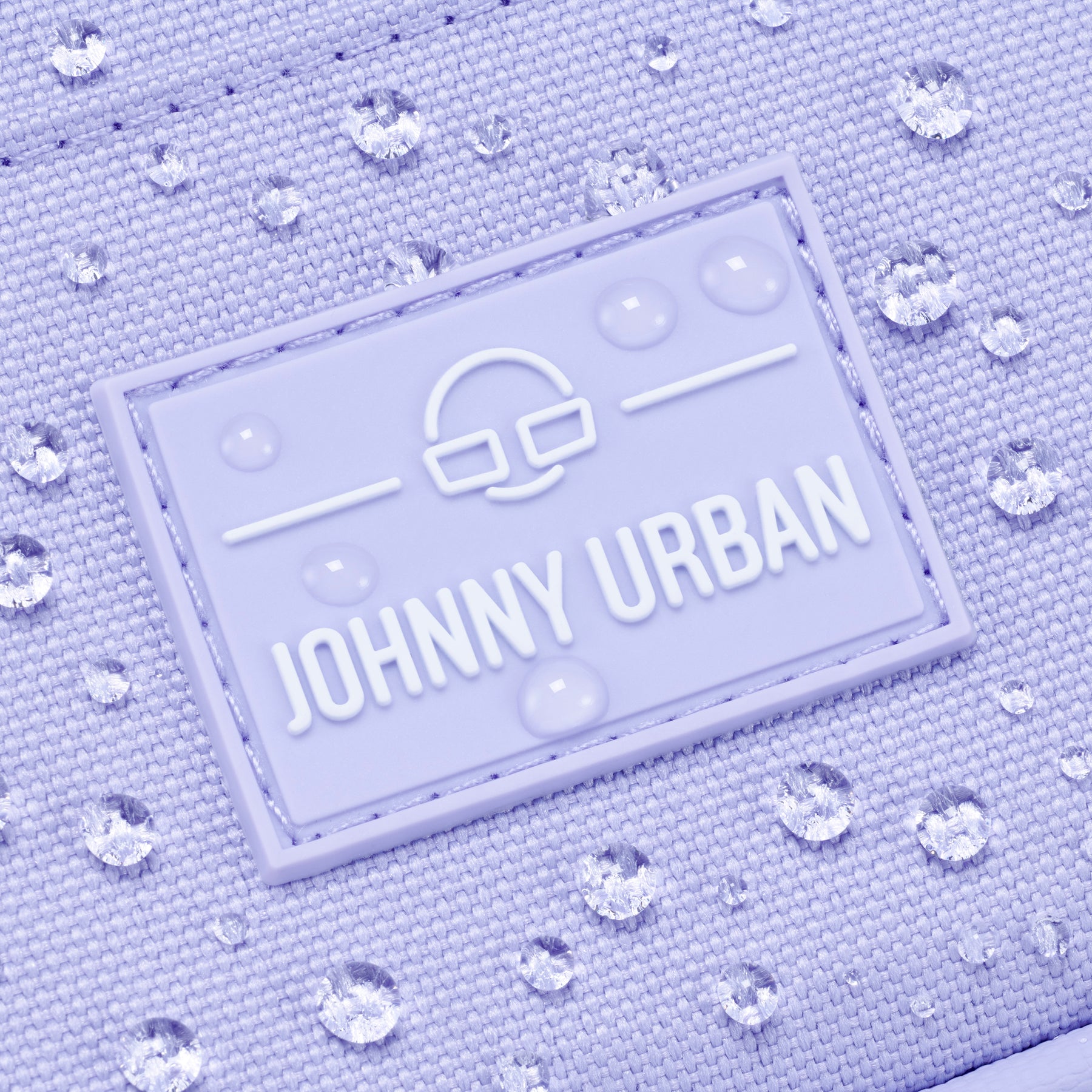 Wasserabweisendes Gewebe des Front Packs 'Arthur' mit Johnny Urban Logo und Wassertropfen