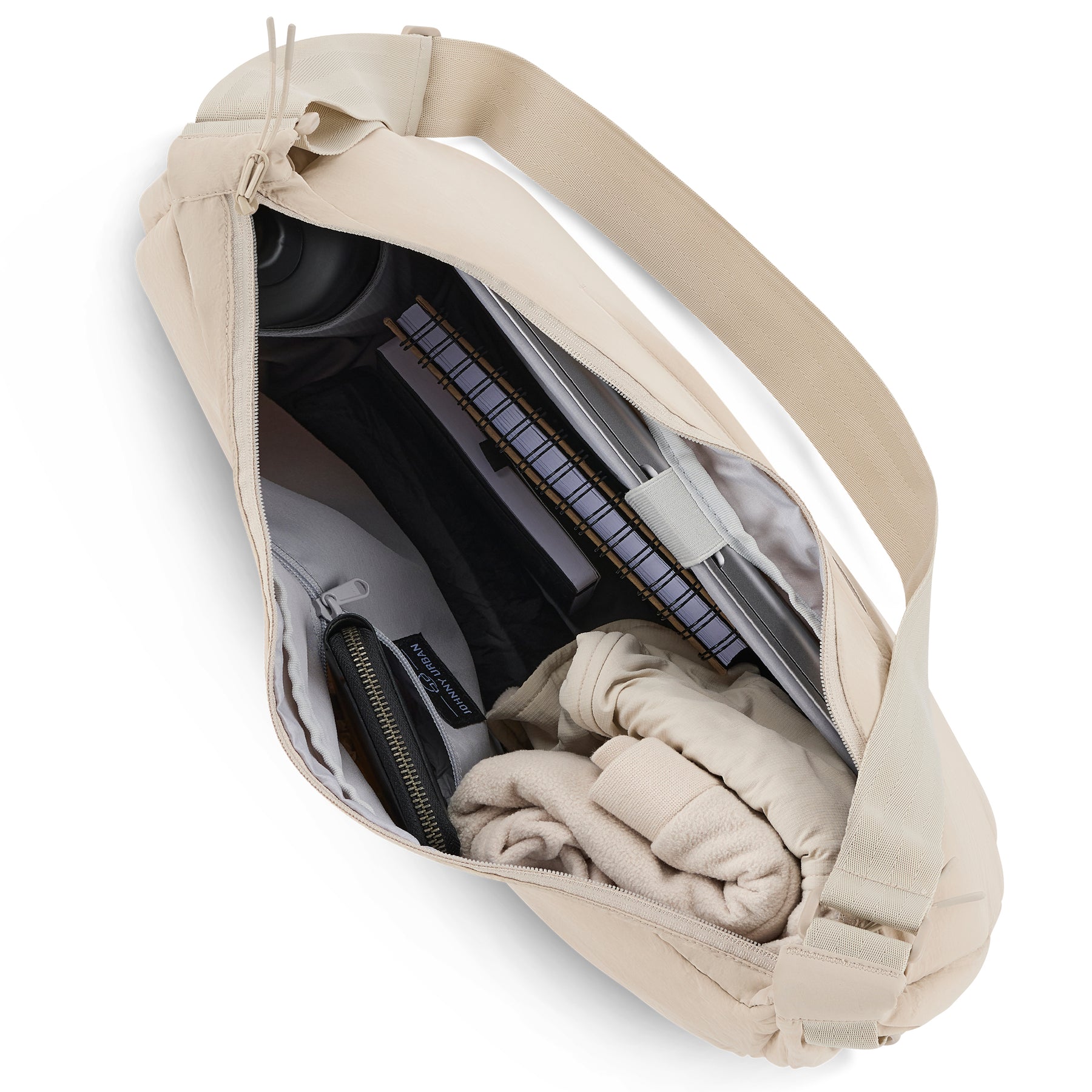 Beige Half Moon Bag Kaia XL von Johnny Urban mit Laptop, Notizbuch, Federmäppchen und Kleidung innen