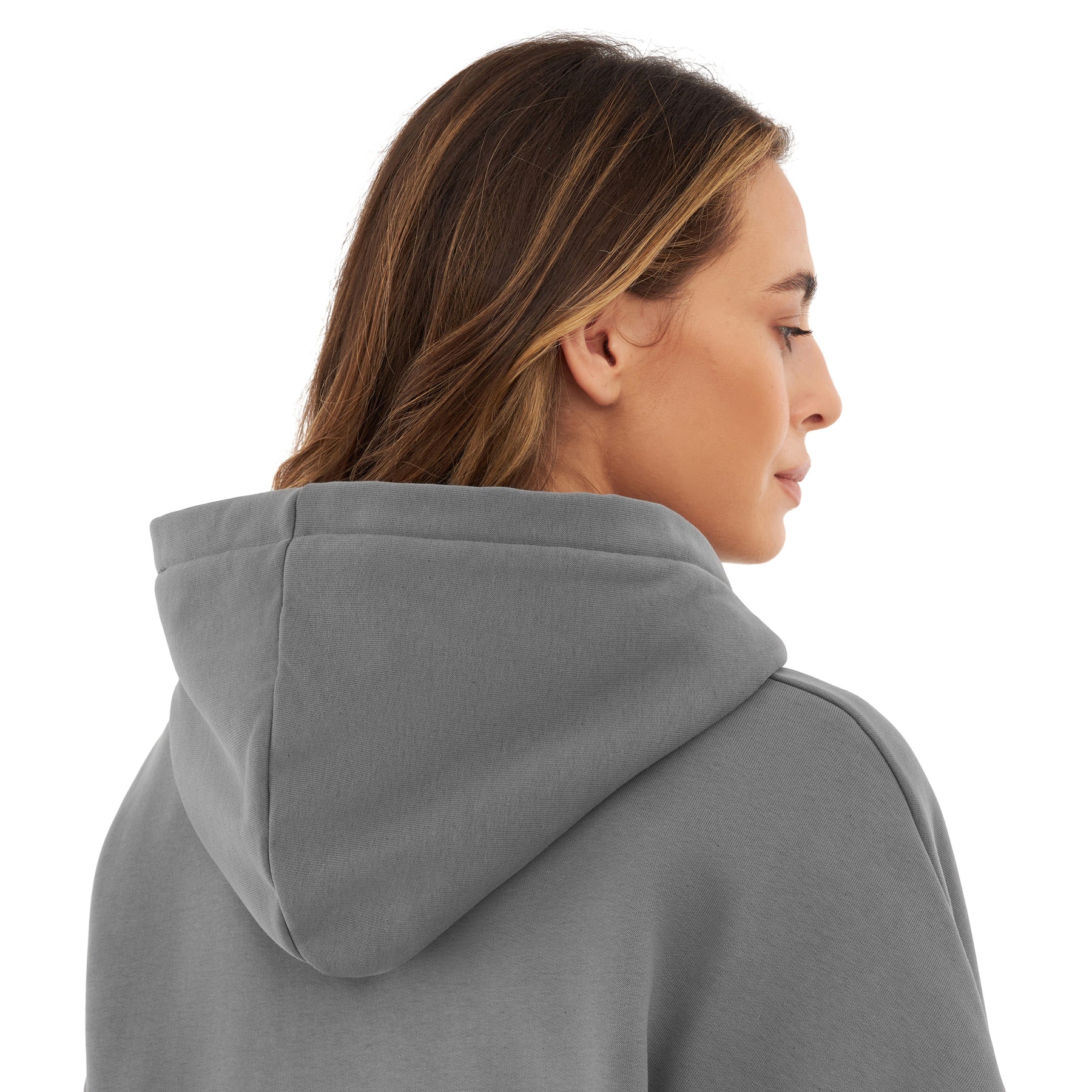 Frau mit hellbraunen Haaren von hinten in grauem, oversized Hoodie 'Cody' mit Kapuze