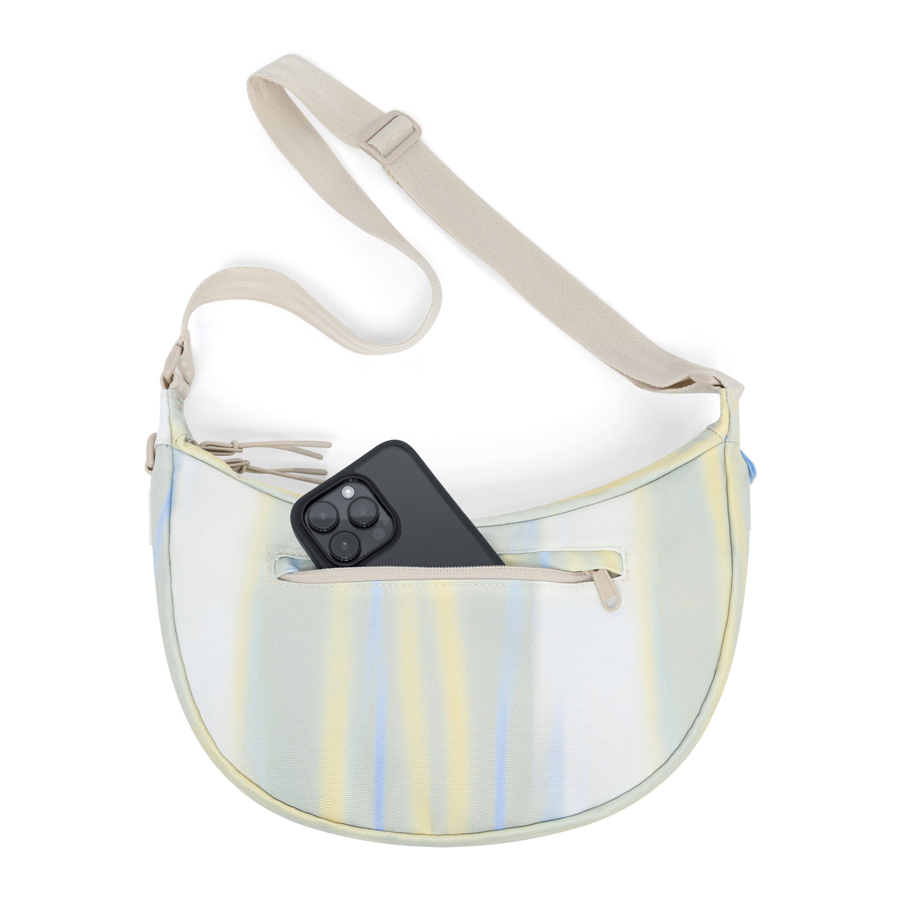 Half Moon Bag 'Ally Medium' in pastellfarbenem Streifenmuster mit Vorderfach und schwarzem Smartphone