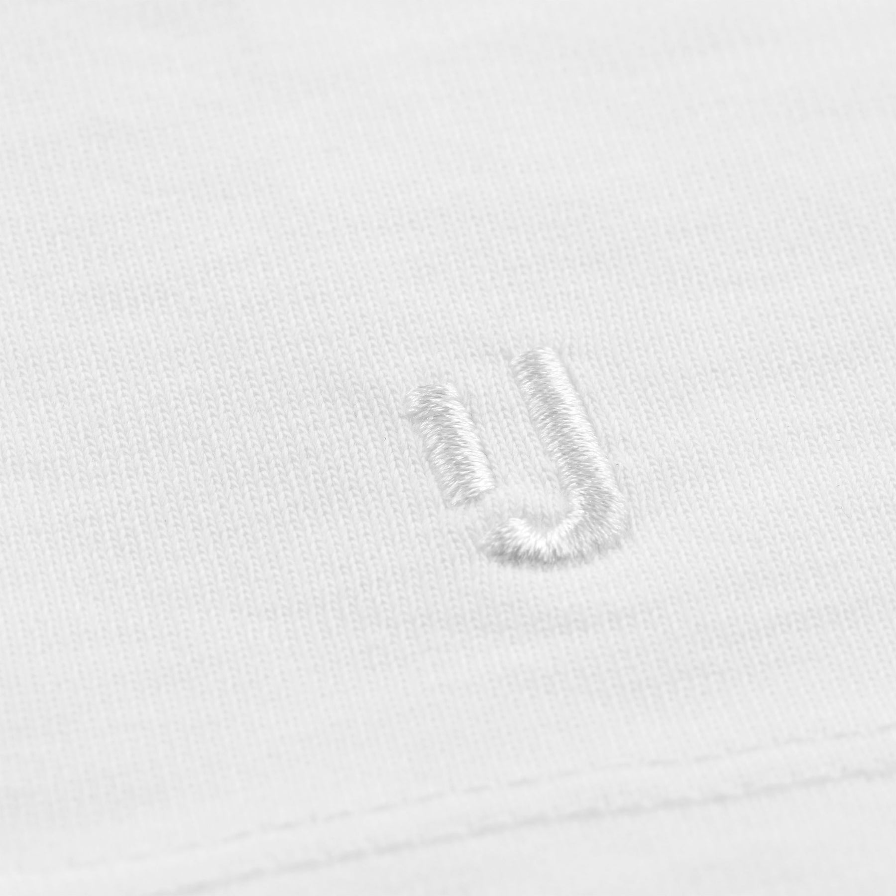 Weiße unisex Oversized-T-Shirt 'Sammy' von Johnny Urban mit weißem Sticklogo