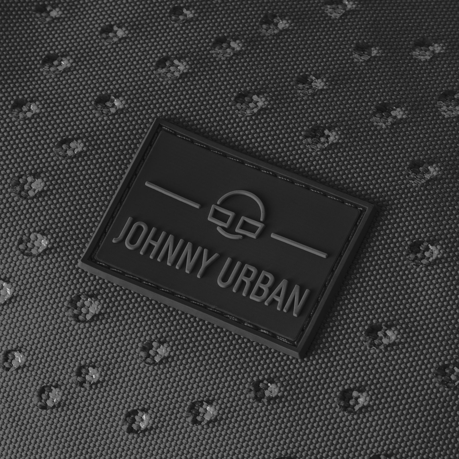 Schwarzes Johnny Urban Logo auf wasserdichtem Stoff mit Tropfenmuster der Weekender Reisetasche Milan