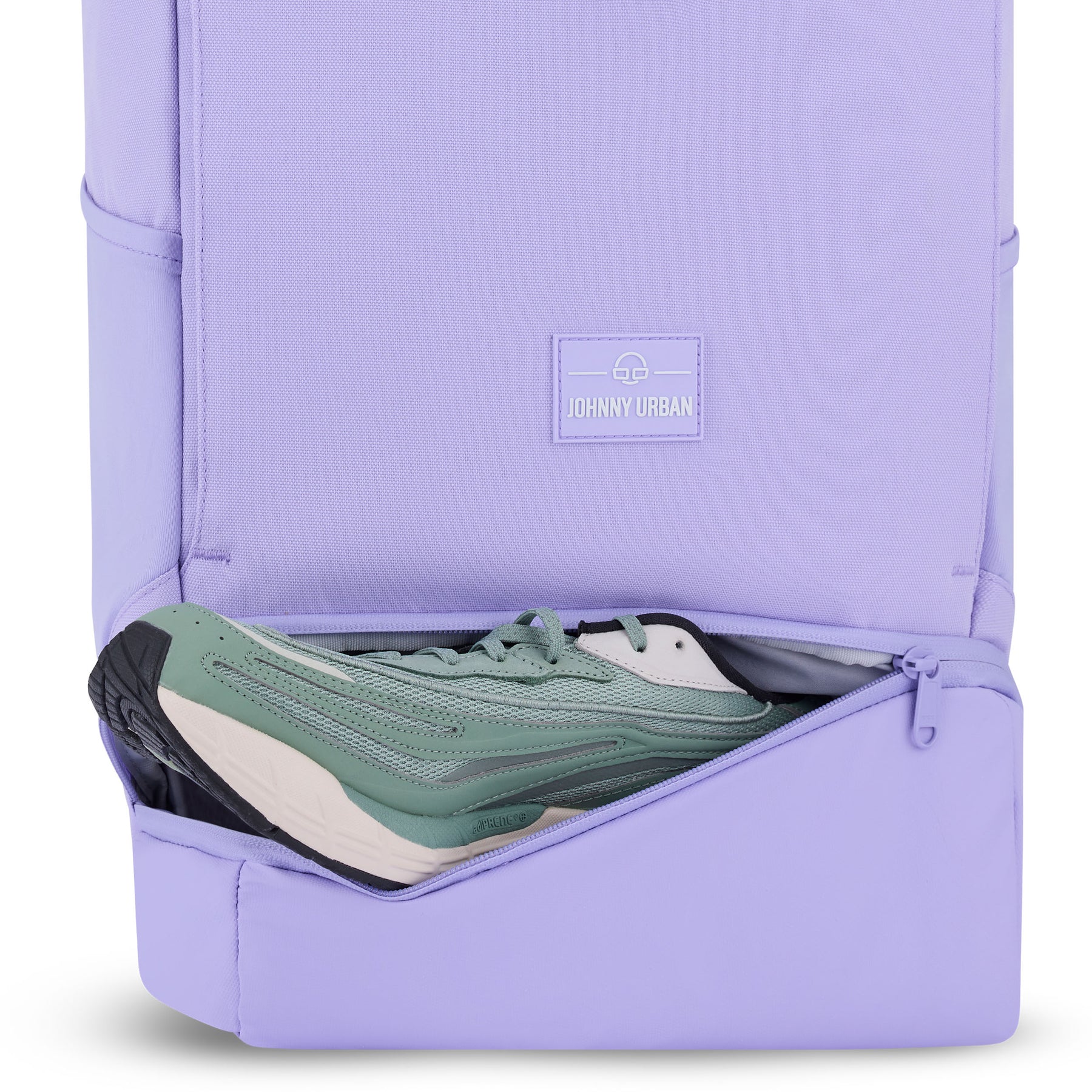 Rolltop Rucksack Allen Medium in flieder mit geöffnetem Schuhfach, grün-weißer Schuh sichtbar