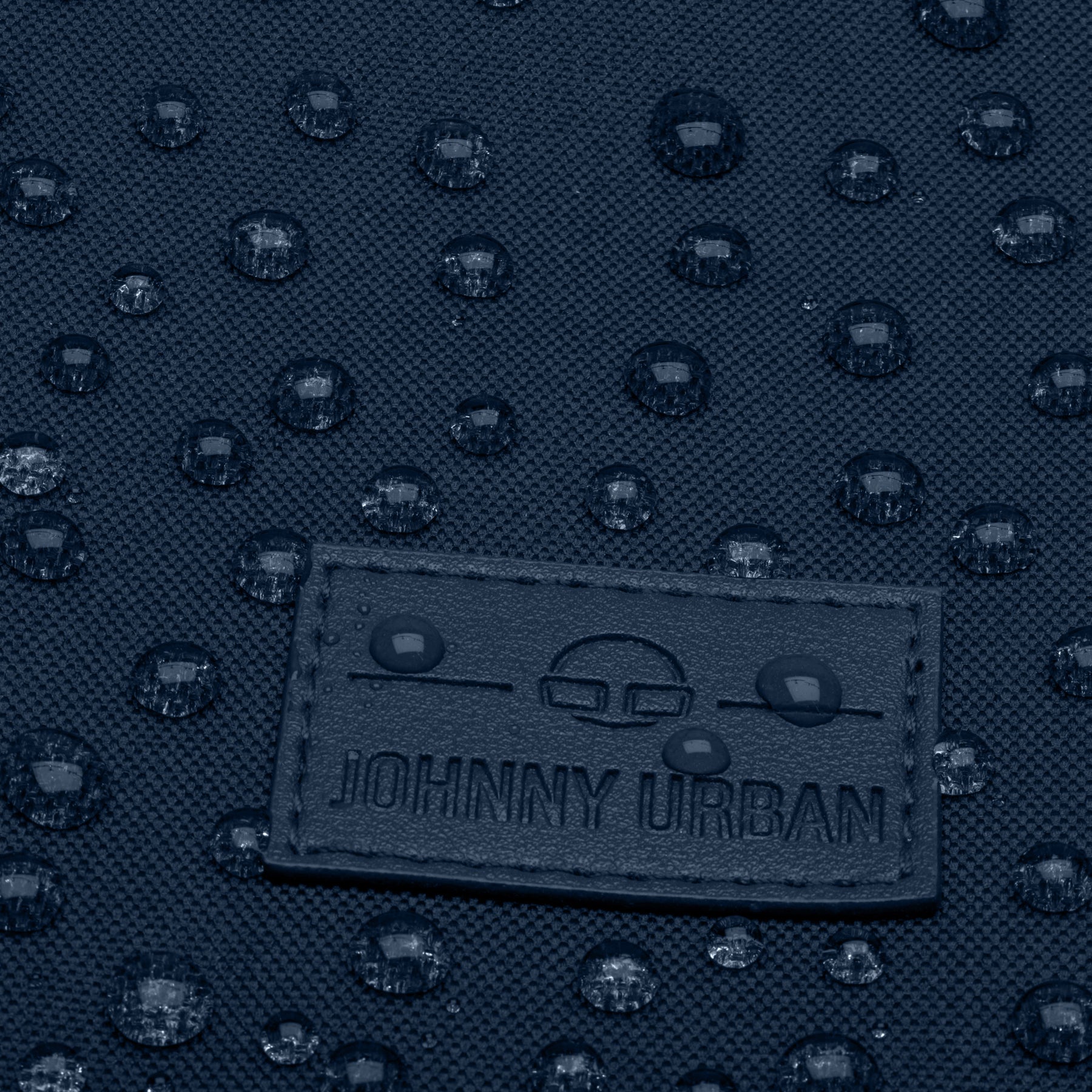 Wasserabweisender blauer Rolltop Rucksack 'Robin Large' von Johnny Urban mit Logo-Aufnäher