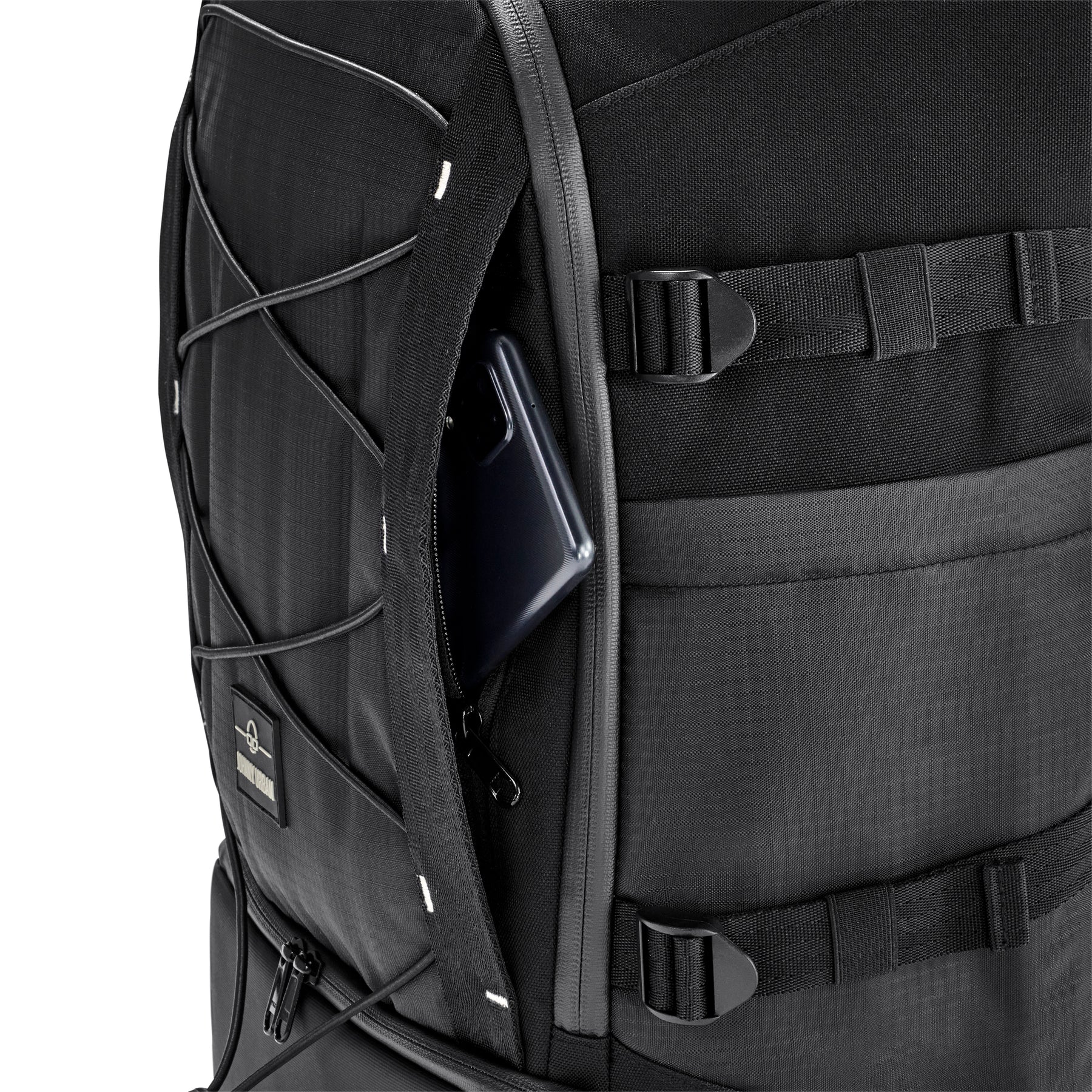 Schwarzer Rucksack 'Jack' mit offenem geheimem Fach und sichtbarem Smartphone