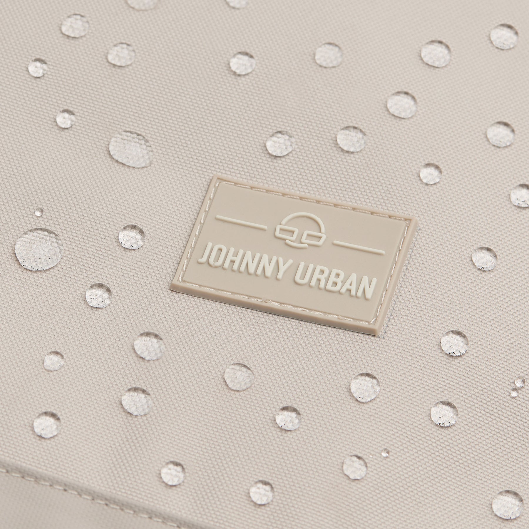 Beige Johnny Urban Rucksack Neo mit wasserabweisender Oberfläche und Logo-Patch