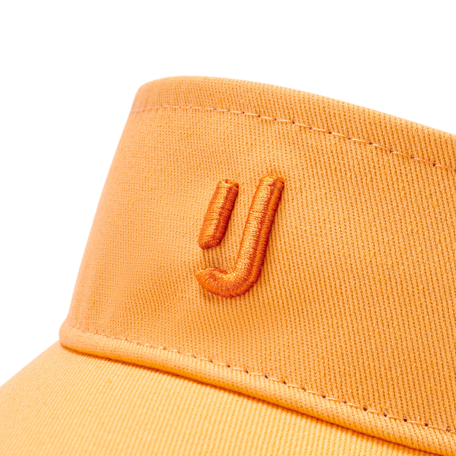 Pfirsichfarbener Sun Visor 'Terry' mit besticktem orangenem 'J'-Logo von Johnny Urban