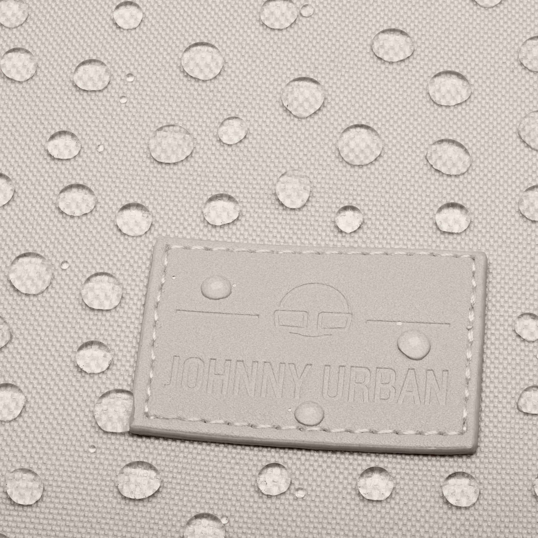 Wasserabweisendes Gewebe mit Johnny Urban Logo auf dem Business-Rucksack Jasper