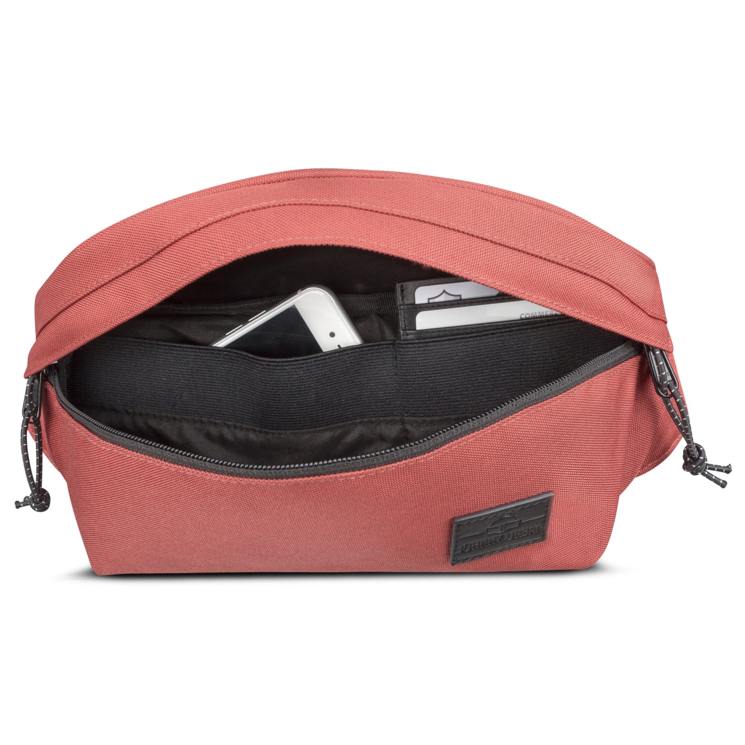 Große rote Bauchtasche 'Tom' mit geöffnetem Hauptfach, darin ein Smartphone und Kartenfächer