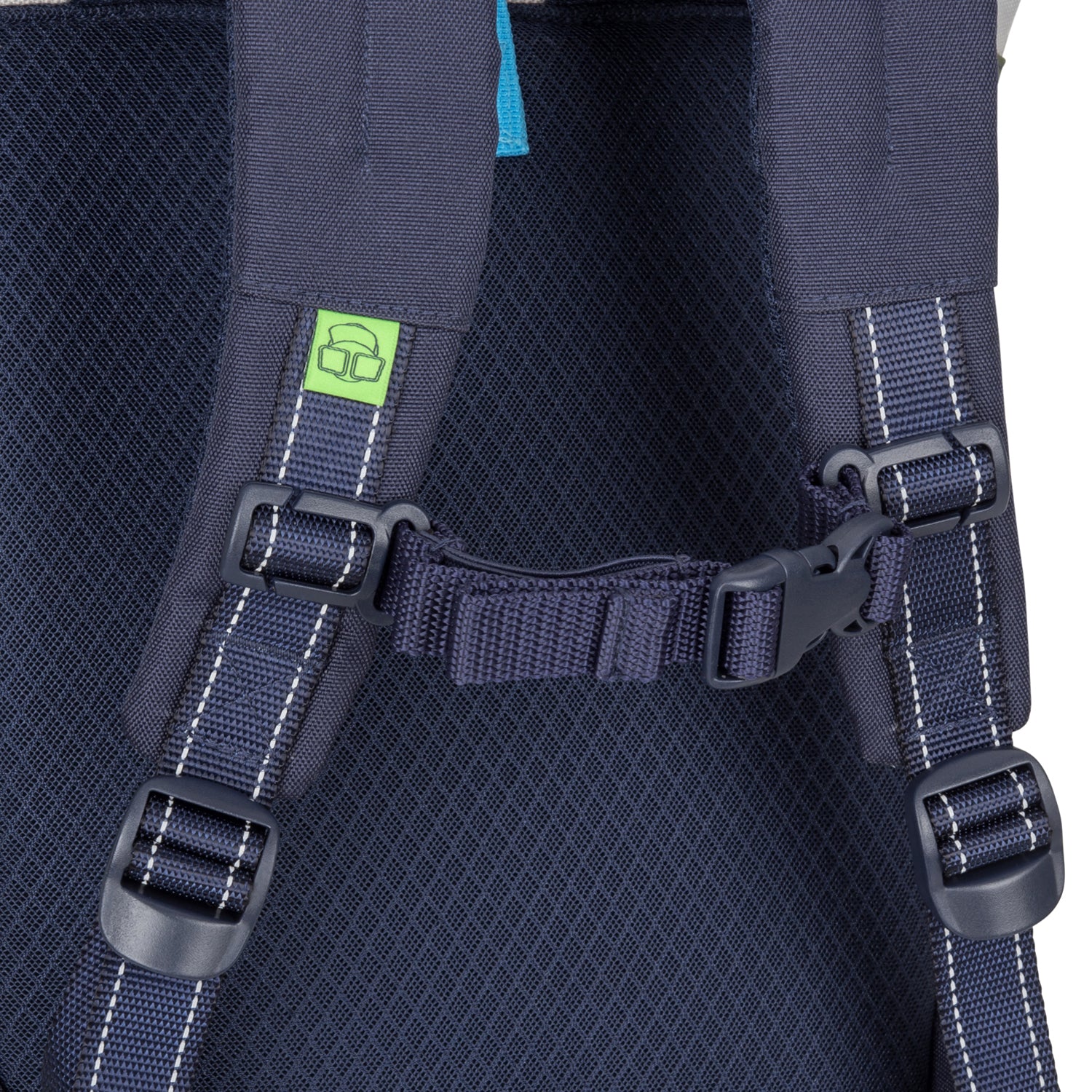 Gepolsterte Kinder-Rucksackgurte mit Steckverschluss und grünem Logo auf dunkelblauem Linus-Rucksack