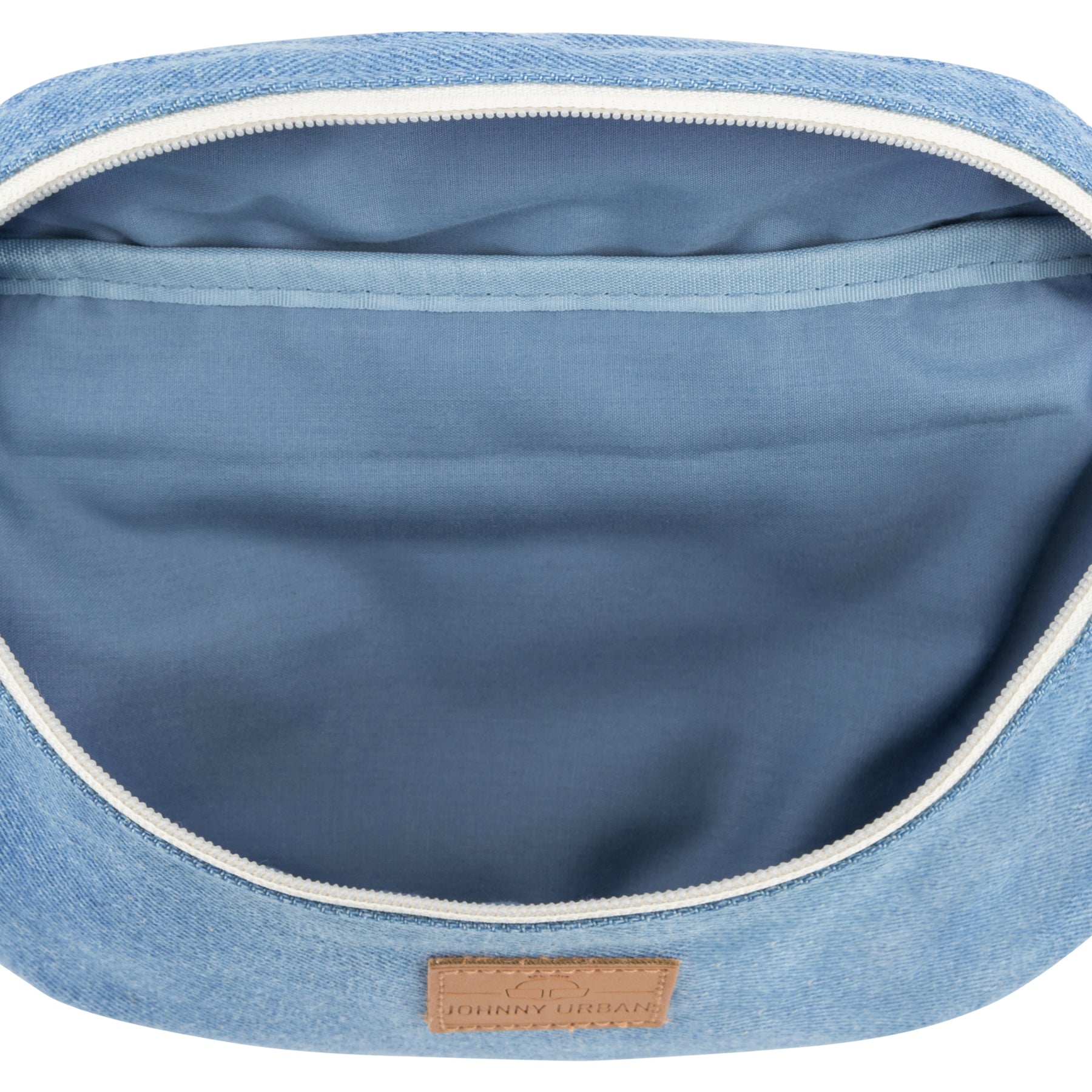 Innenansicht der kleinen Bauchtasche 'Toni' aus Jeansstoff mit blauem Innenfutter und Reißverschluss