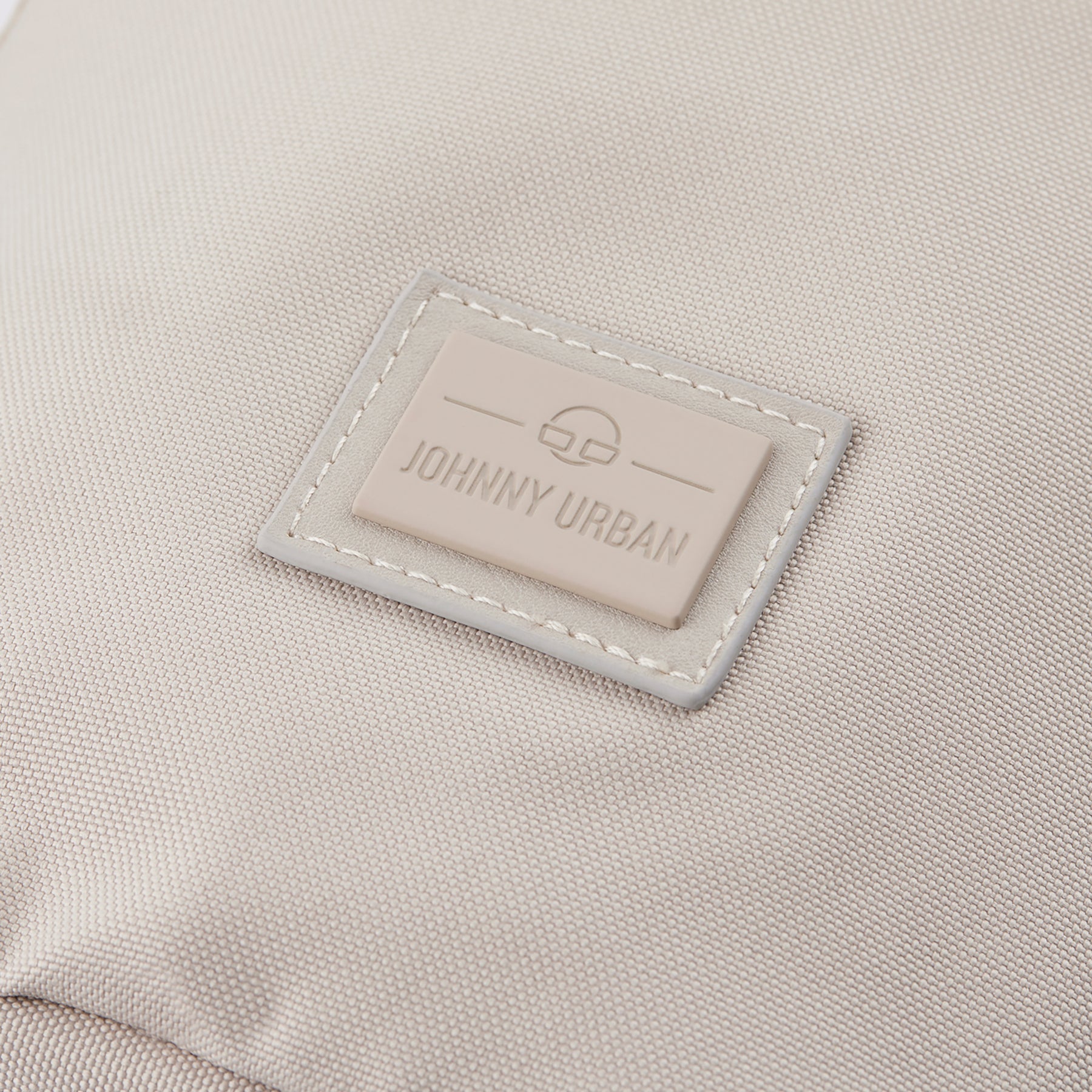 Beige Stoff mit Johnny Urban Logo auf Umhängetasche Rue