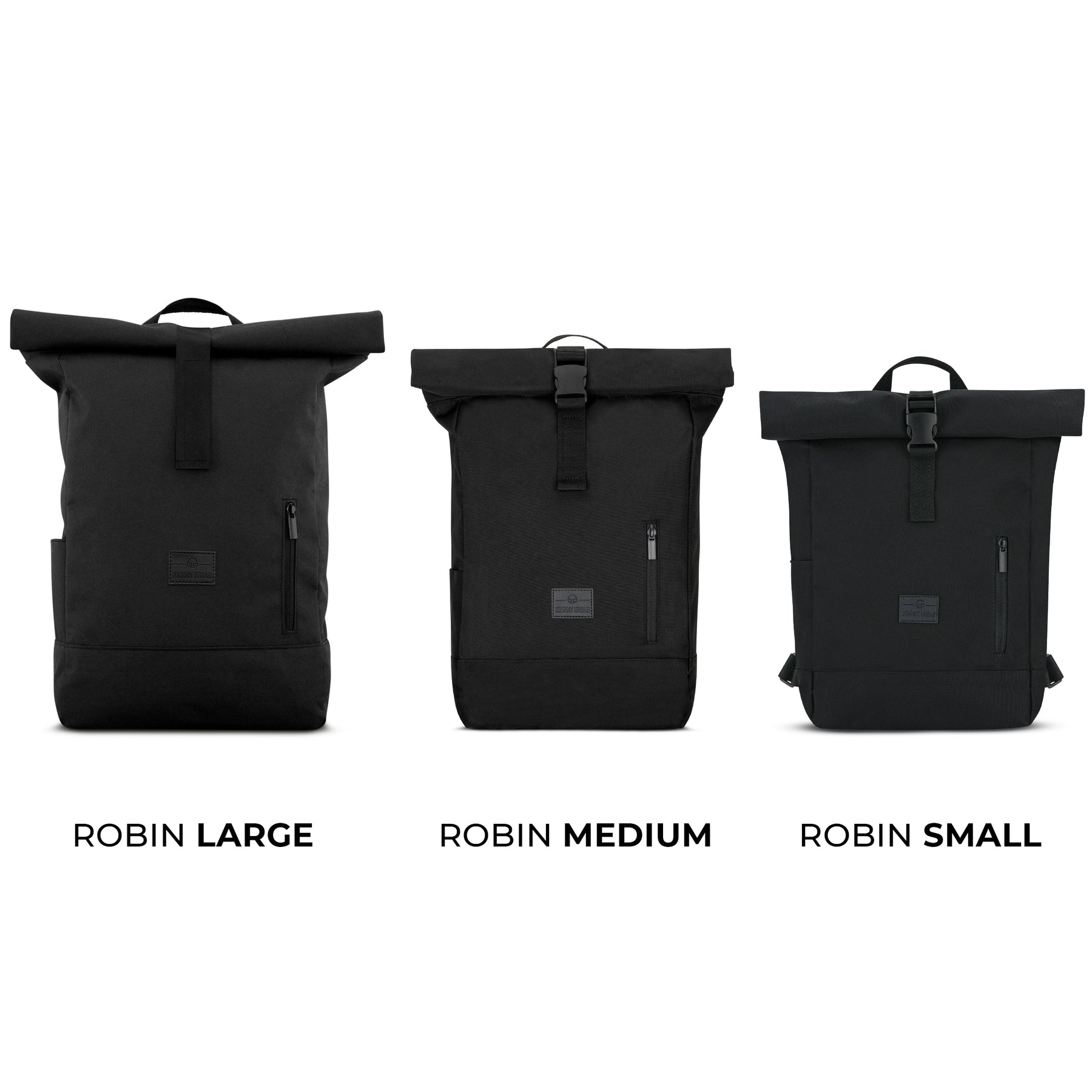 Drei schwarze Johnny Urban Rolltop Rucksäcke Modell Robin in den Größen Large, Medium und Small nebeneinander