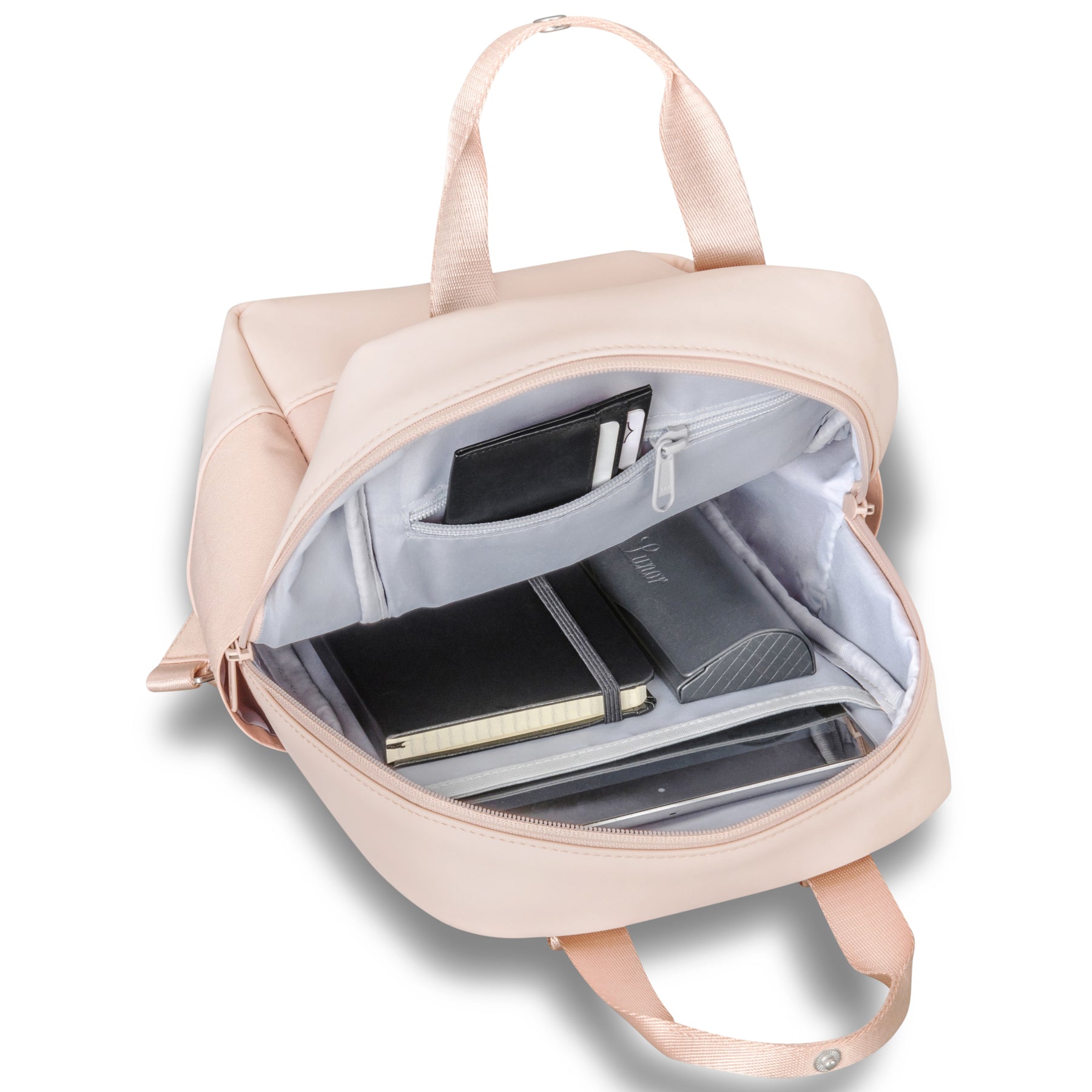 Heller Rucksack 'Jona Small' mit geöffnetem Hauptfach und innen liegendem schwarzen Notizbuch, Brillenetui und Geldbörse