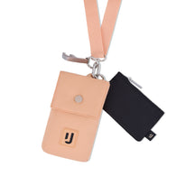 Halsbeutel "Juno" von Johnny Urban in beige mit kleinem schwarzen Reißverschlussfach und Karabiner