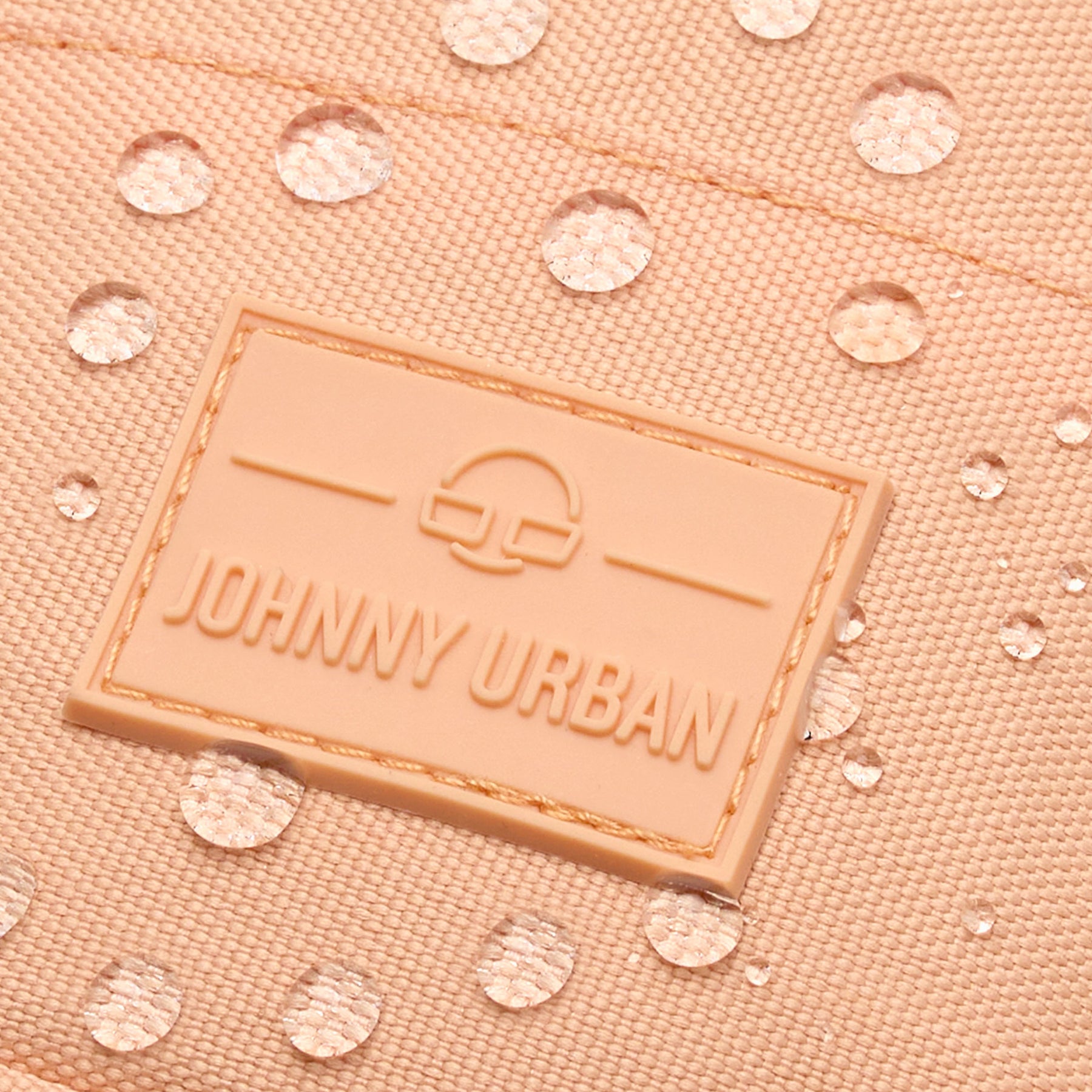 Wasserabweisendes, pfirsichfarbenes Material mit JOHNNY URBAN Logo auf Umhängetasche 'Josh'