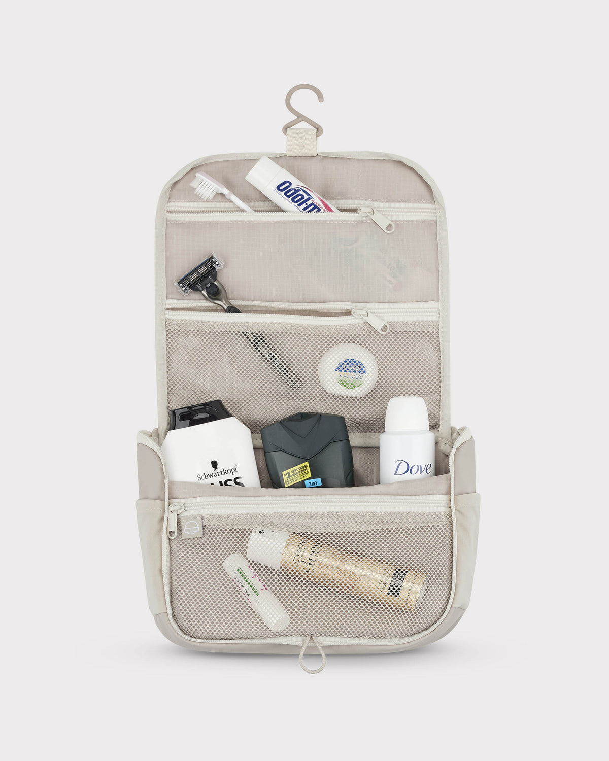 Beige Kulturtasche 'Logan' mit transparenter Aufteilung, Zahnbürste, Zahnpasta, Rasierer und Pflegeprodukten