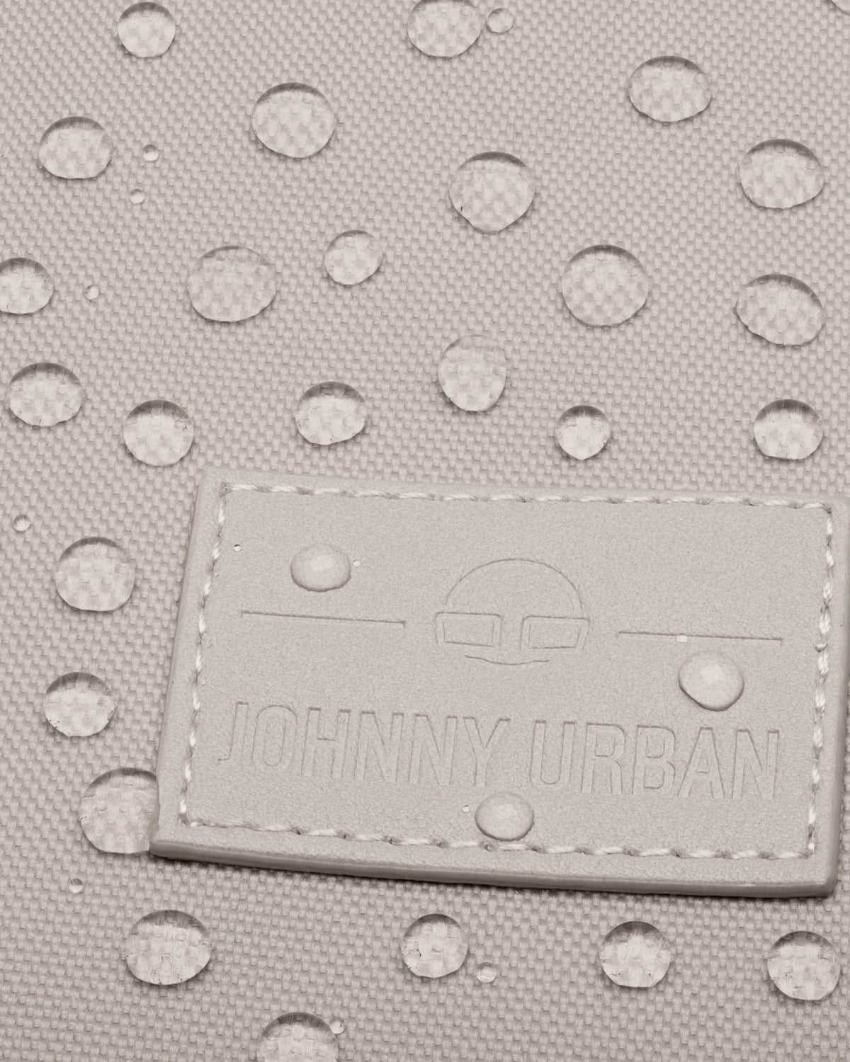 Wasserabweisendes Gewebe mit Johnny Urban Logo auf dem Business-Rucksack Jasper