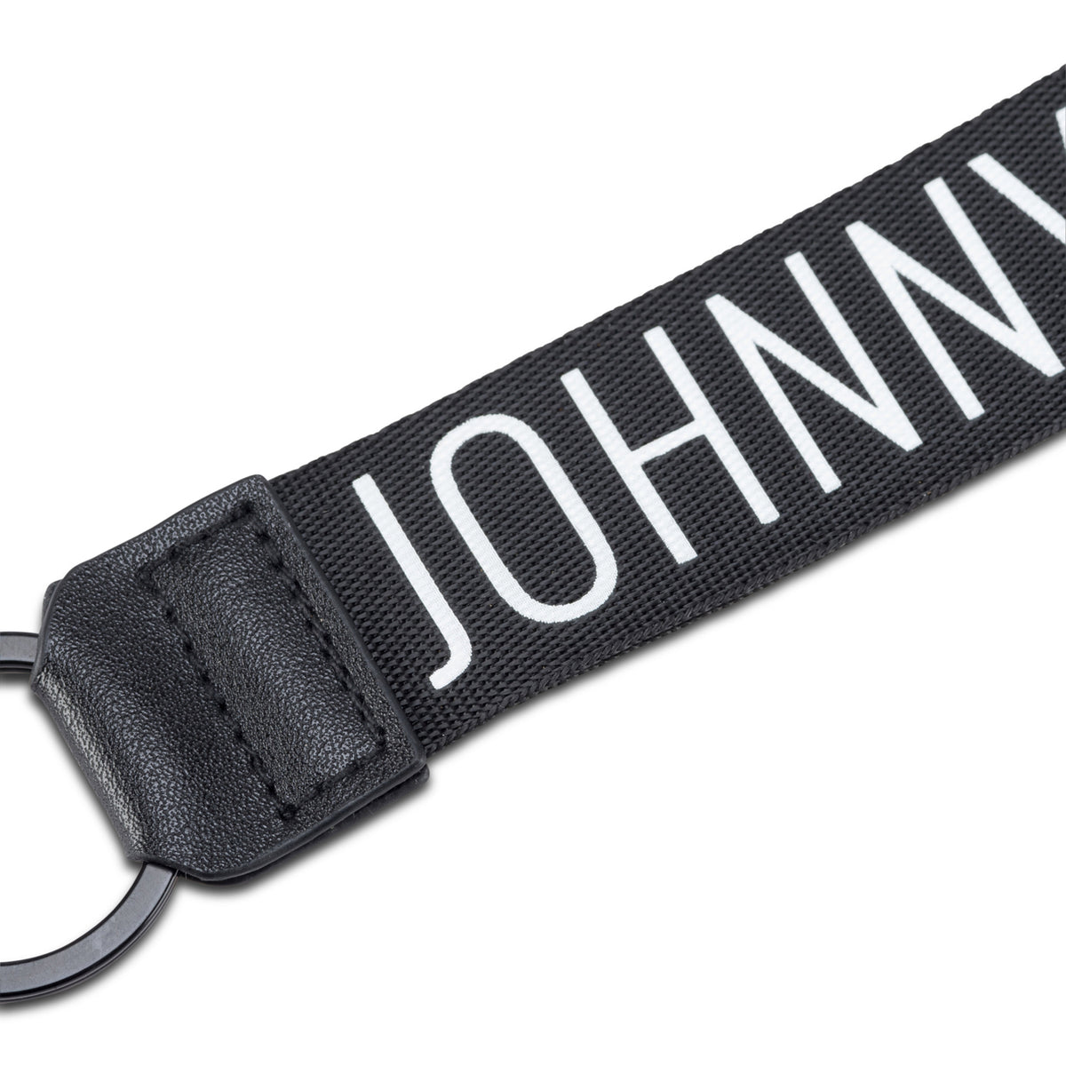 Schlüsselband Nick von Johnny Urban aus schwarzem Stoff mit weißem Logo und schwarzem Lederabschluss